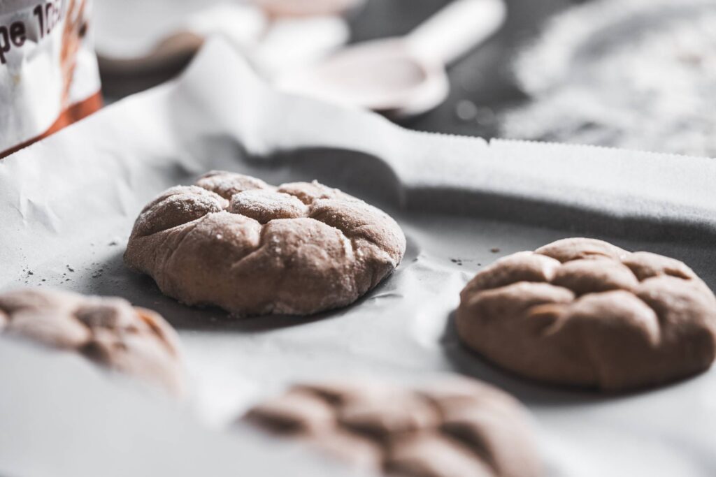 Preparing Homemade Kaiser Roll for Baking Free Photo