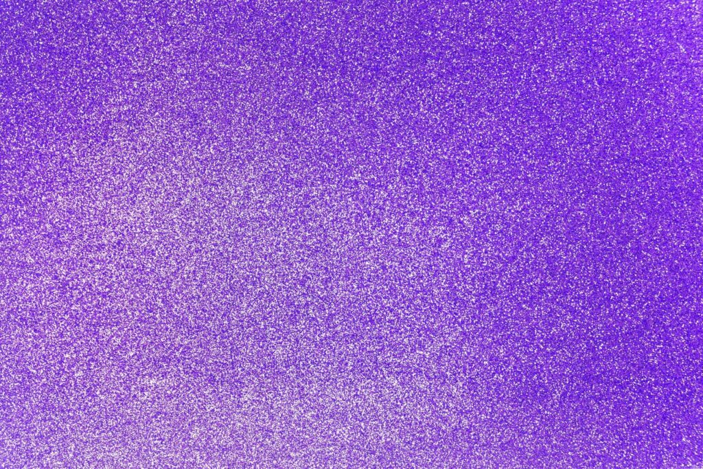 Purple glitter shiny texture background Stock Free