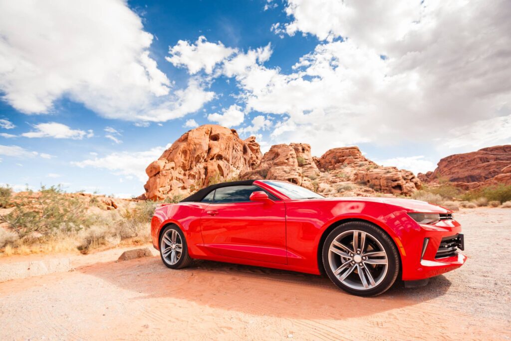 Red Convertible in a National Park Free Photo