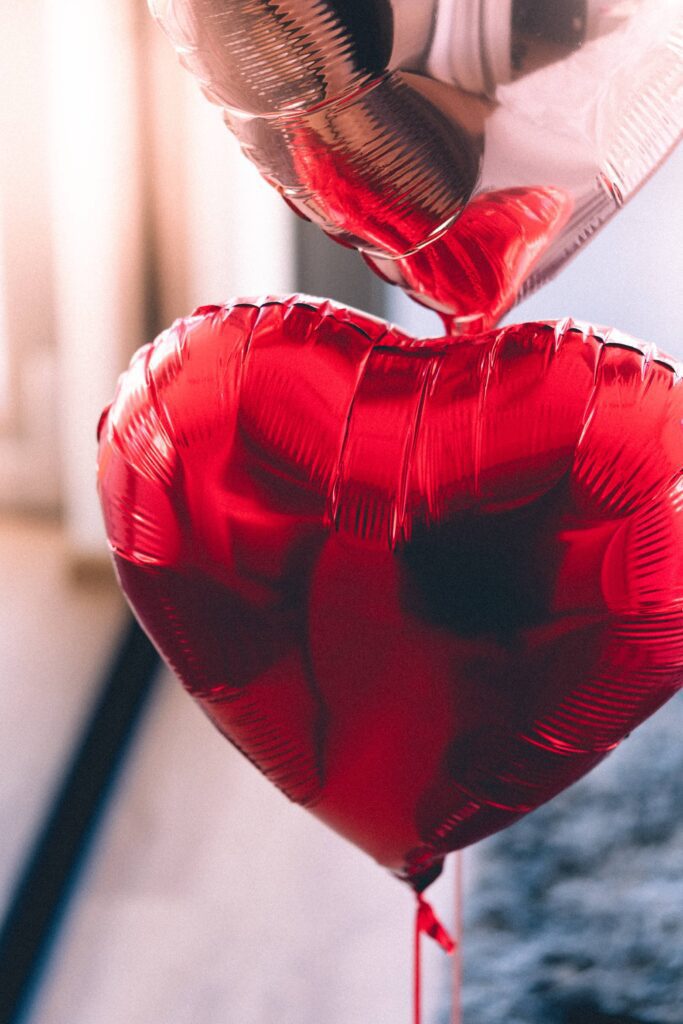 Red Heart-Shaped Metallic Balloon Free Photo