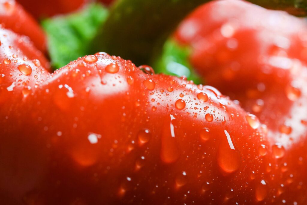 Red Paprika in Water Drops Close Up Free Photo