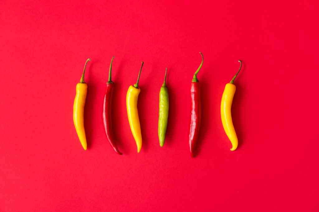 Red, Yellow and Green Hot Chilli Peppers Free Photo