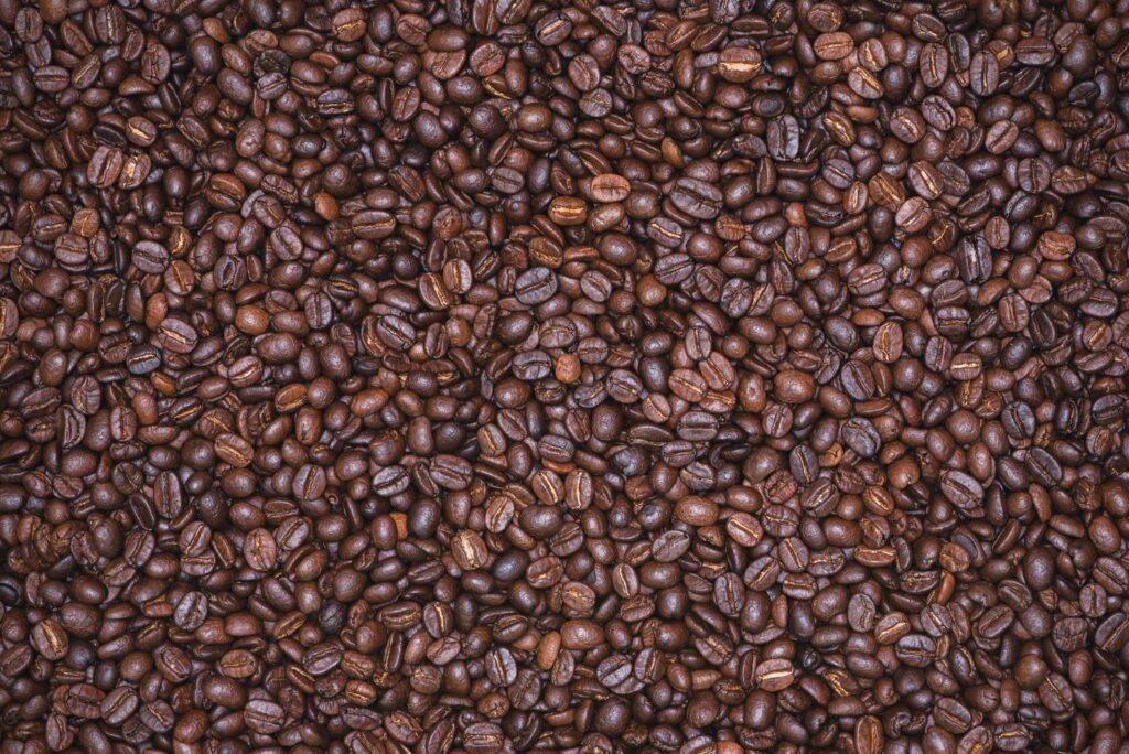 Roasted coffee beans background, Photo coffee close up Stock Free