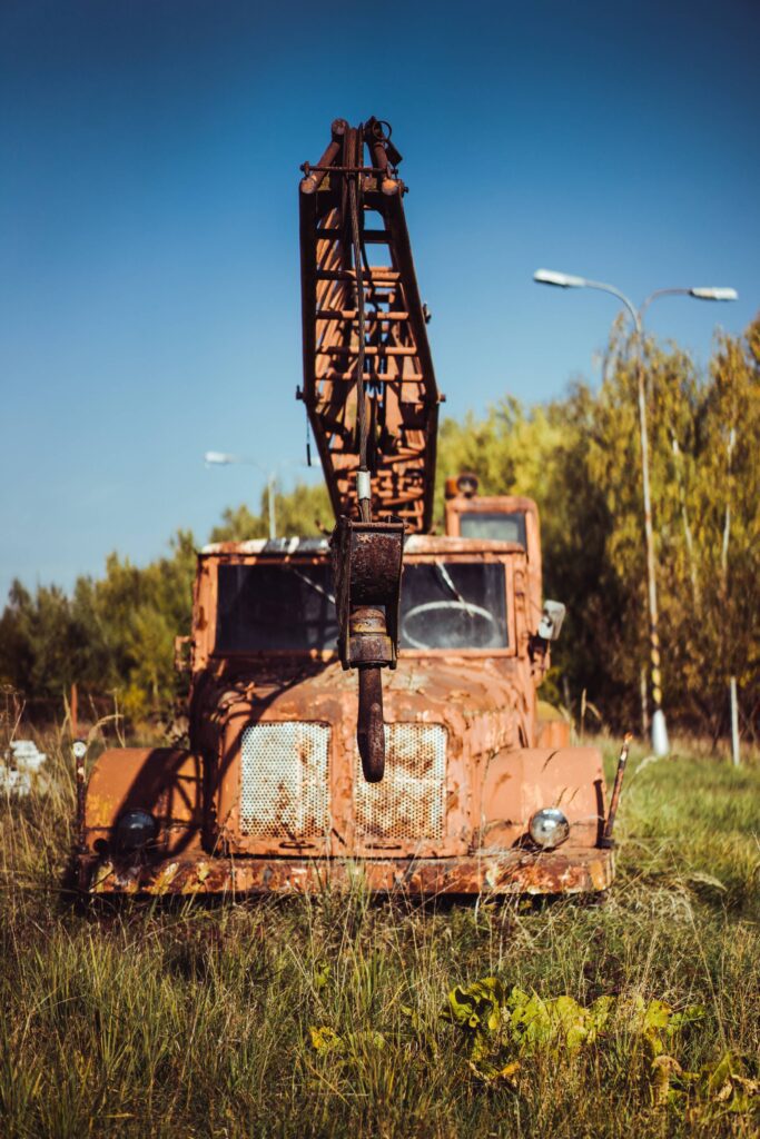 Rusty & Abandoned Crane Truck Free Photo