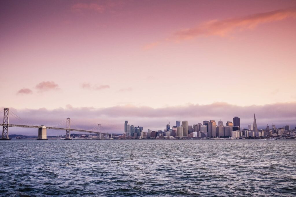 San Francisco Evening Skyline and Bay Bridge at Sunset Free Photo