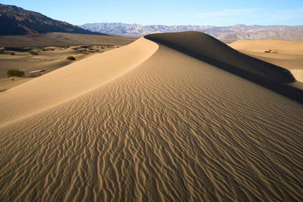 Sand Dunes in Death Valley Desert shaped into S Free Photo