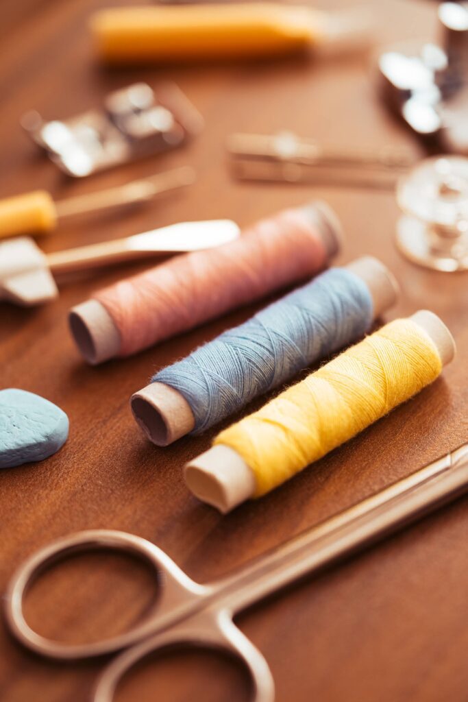 Sewing Kit on The Wooden Table Free Photo