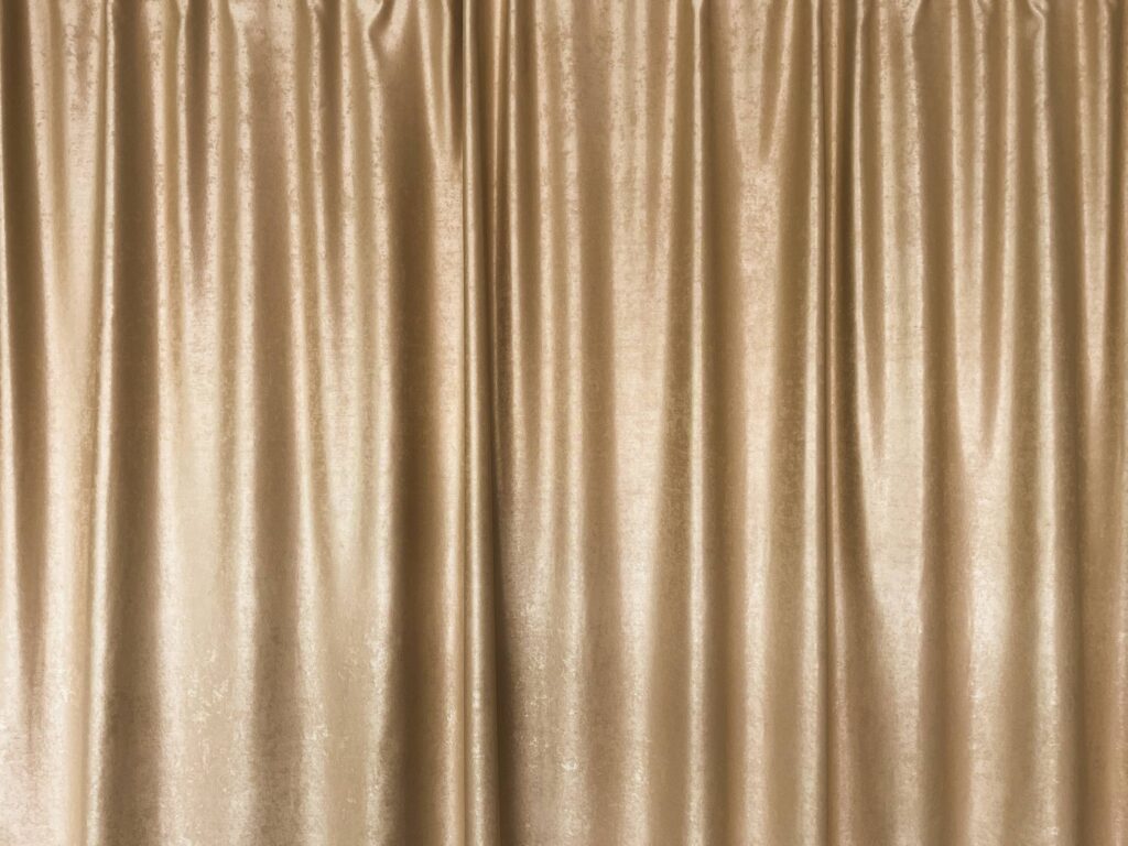 Shiny Golden Curtain Background Free Photo