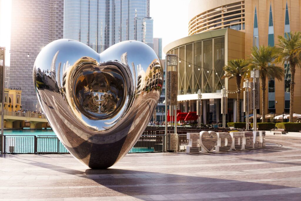 Shiny Metallic Heart-shaped Statue in the Middle of the City in Dubai Free Photo