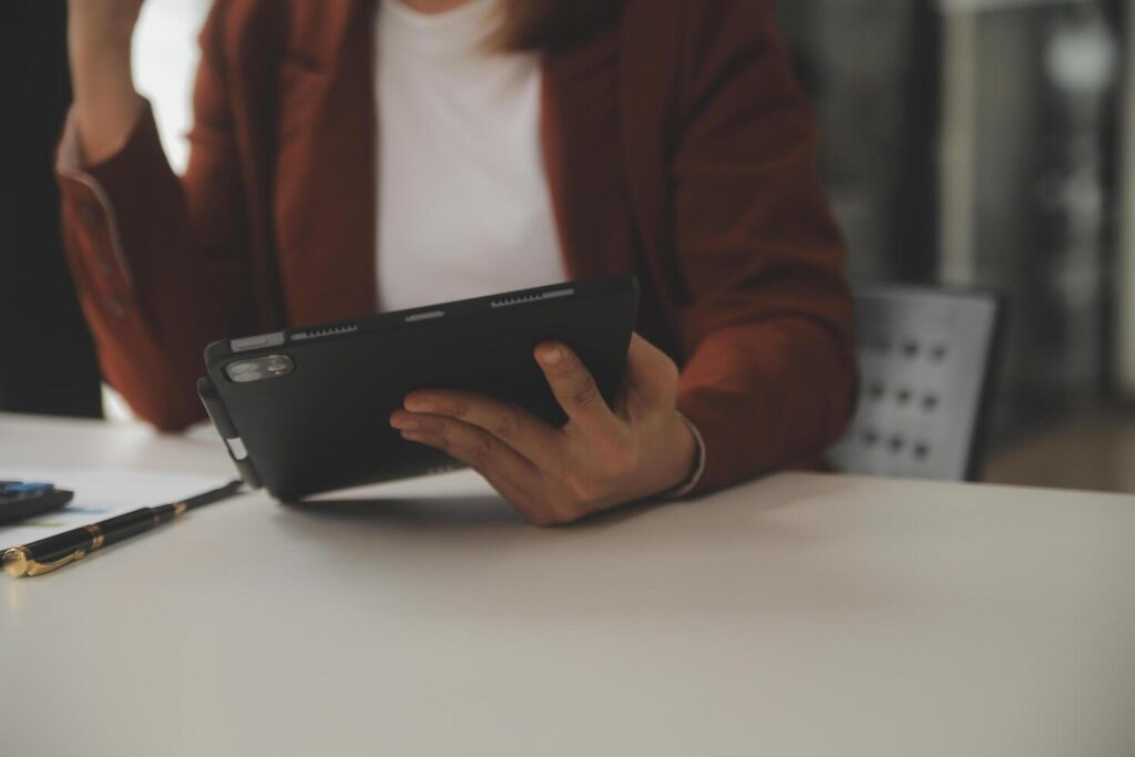 Shot of a asian young business Female working on laptop in her workstation. Stock Free