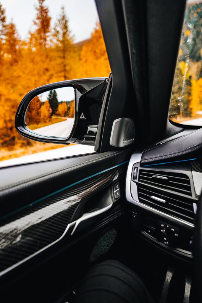 Side View Mirror in a Luxury Car Free Photo