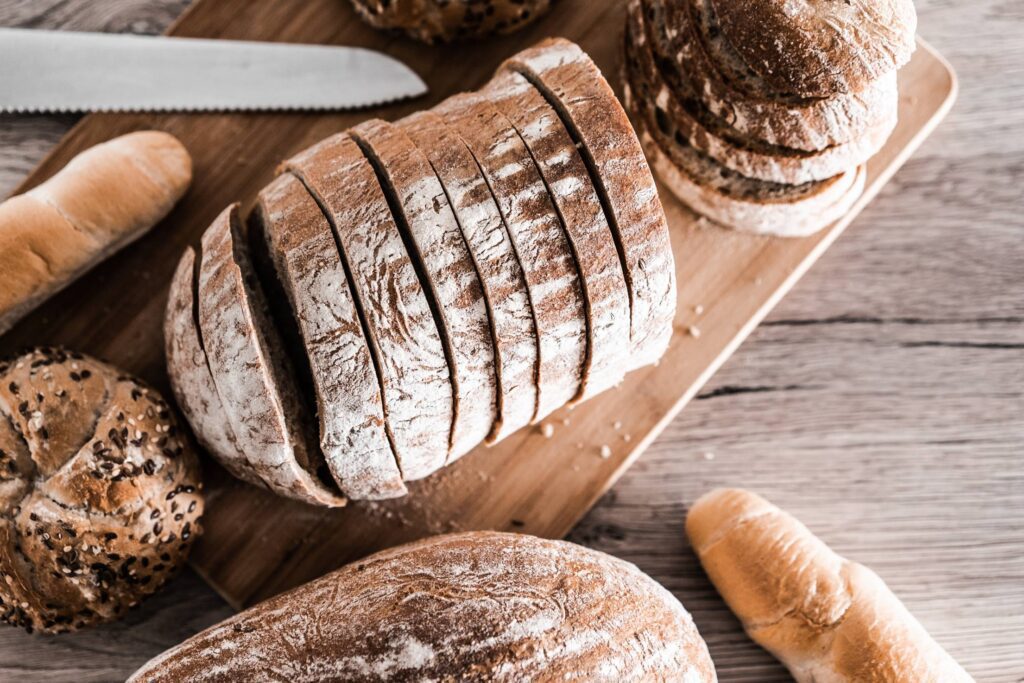 Sliced Bread on a Wooden Table Free Photo