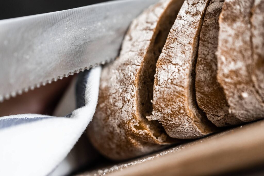 Slicing Bread Knife Close Up Free Photo