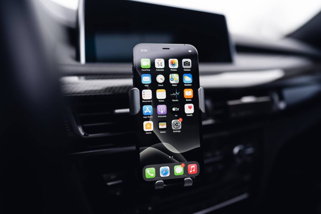 Smartphone in a Car Holder Free Photo