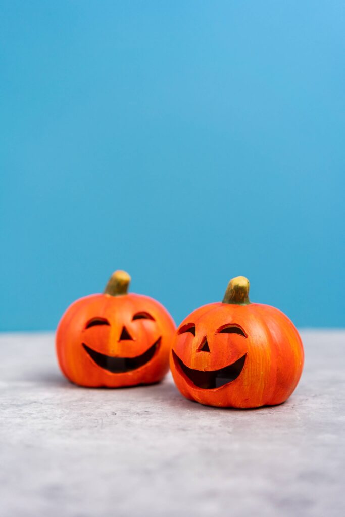 Smiling Halloween Pumpkins Vertical Free Photo