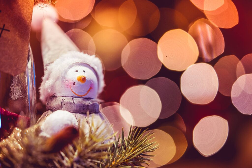 Snowman Decoration with Christmas Bokeh Free Photo