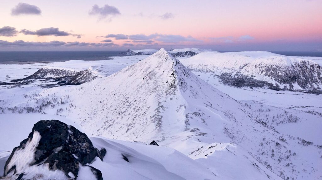 Snowy Mountain Ridge During Dusk Free Photo