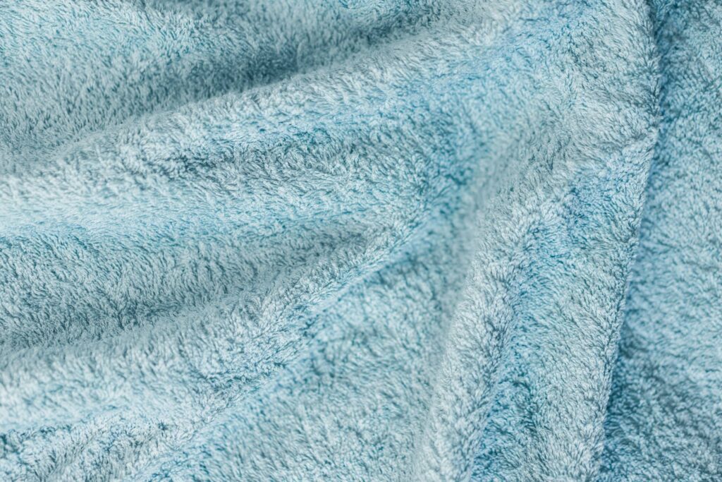 Soft Cotton Blue Towel Close Up Background Free Photo