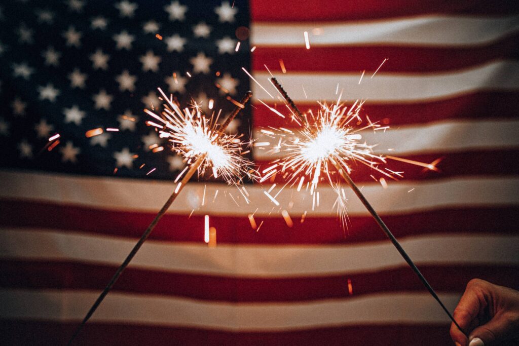 Sparklers and American Flag Free Photo