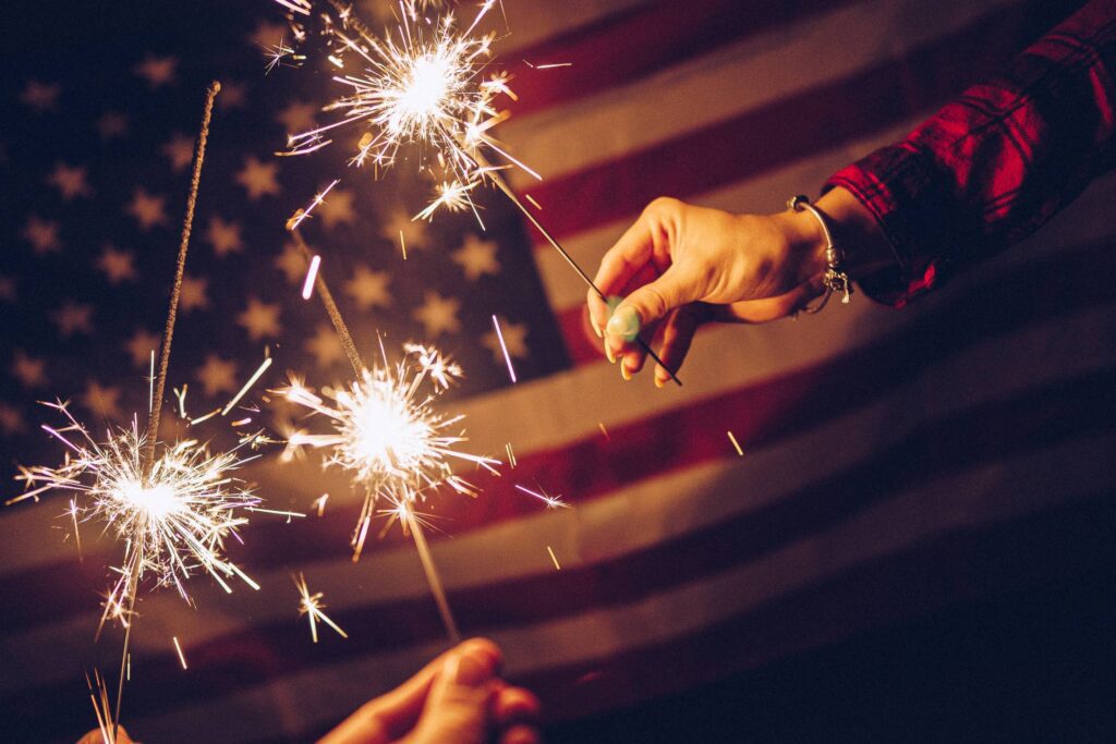 Sparklers and USA Flag Free Photo