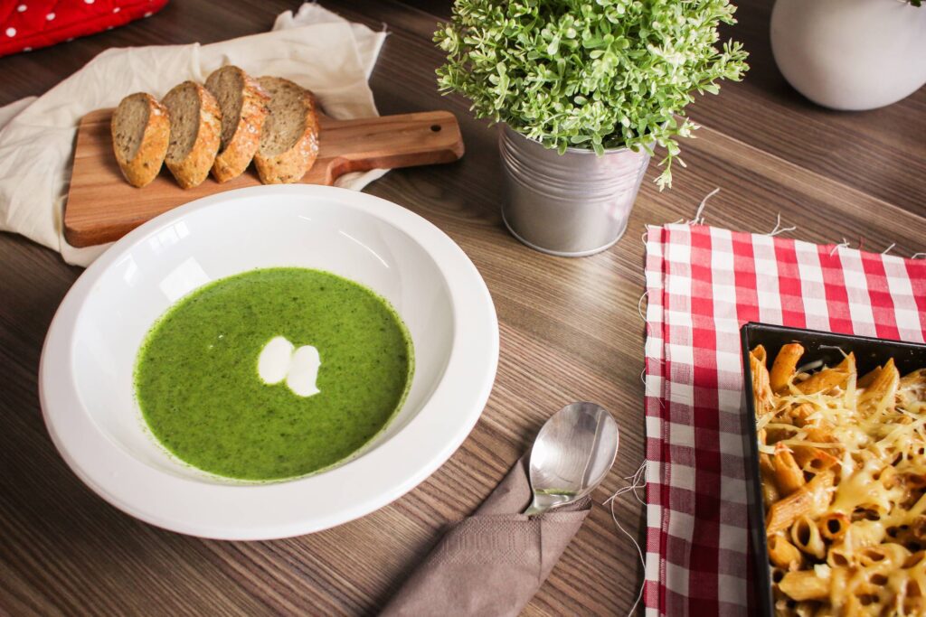 Spinach Soup with Slices of Bread Free Photo