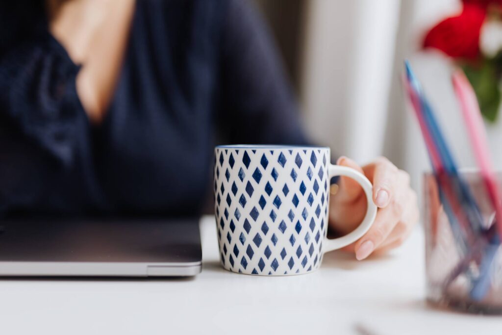 Starting New Creative Day with Blue Coffee Mug Free Photo