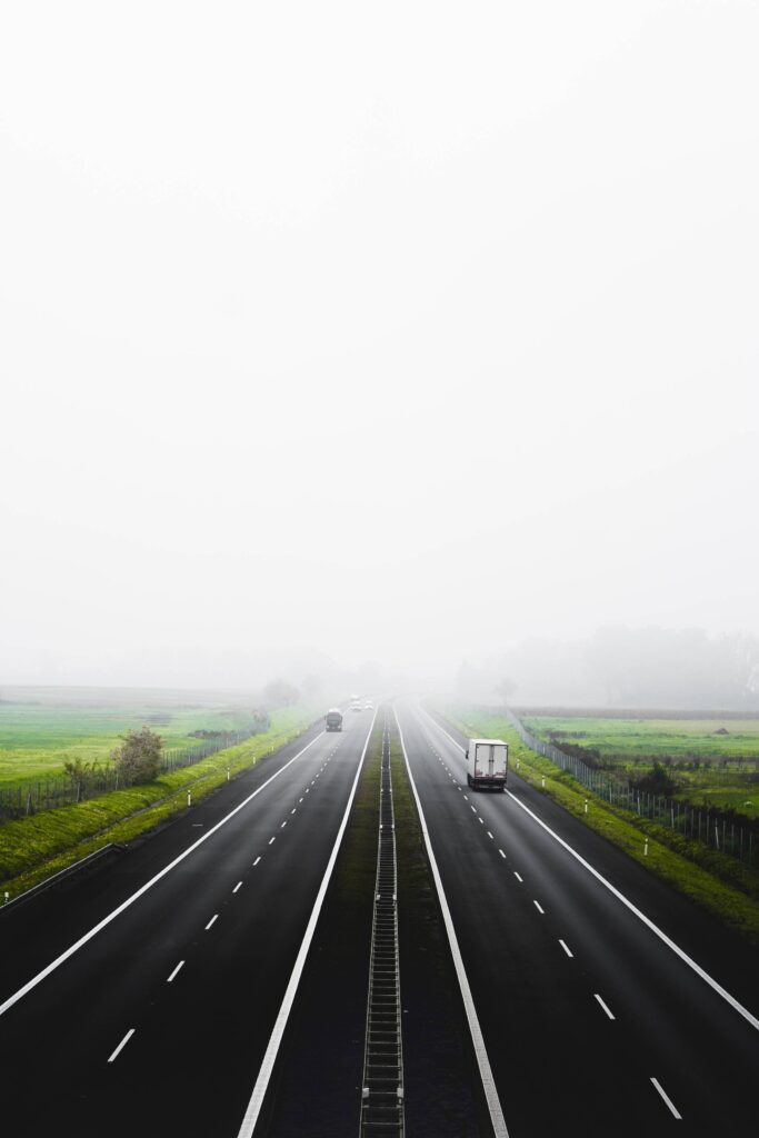 Straight Highway in The Fog Free Photo