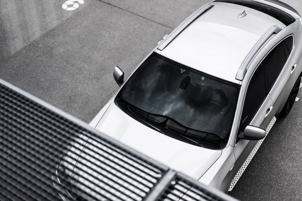 SUV Car Parked in Front of a Building Free Photo