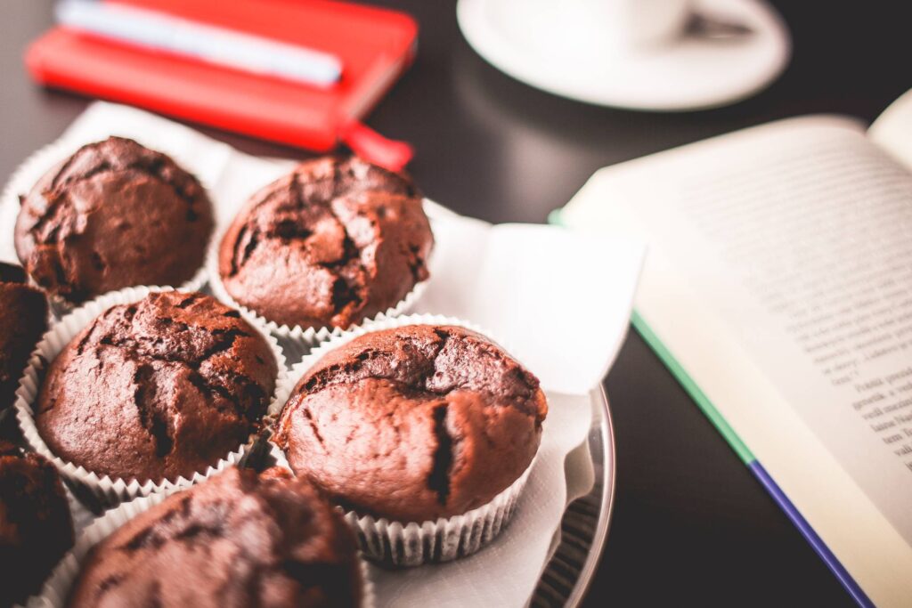 Sweet Muffins with A Book Free Photo