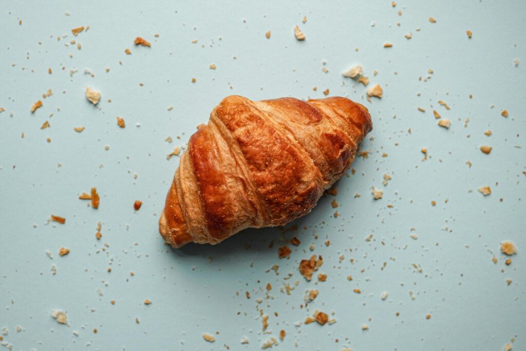 tasty croissant for breakfast, french food Stock Free