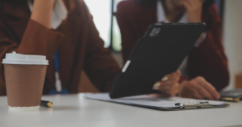 Teamwork with business people analysis cost graph on the desk in the meeting room. The business team discussed meetings and briefing strategies. Negotiation, Analysis, Discussion Stock Free