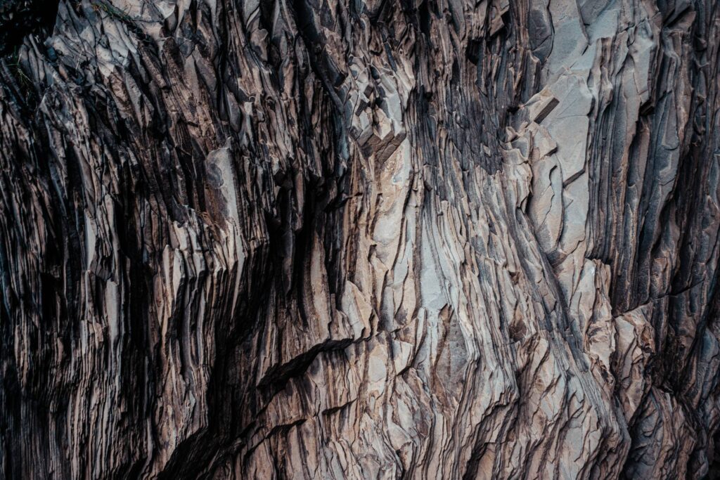 Texture of a Layered Dark Rock Free Photo