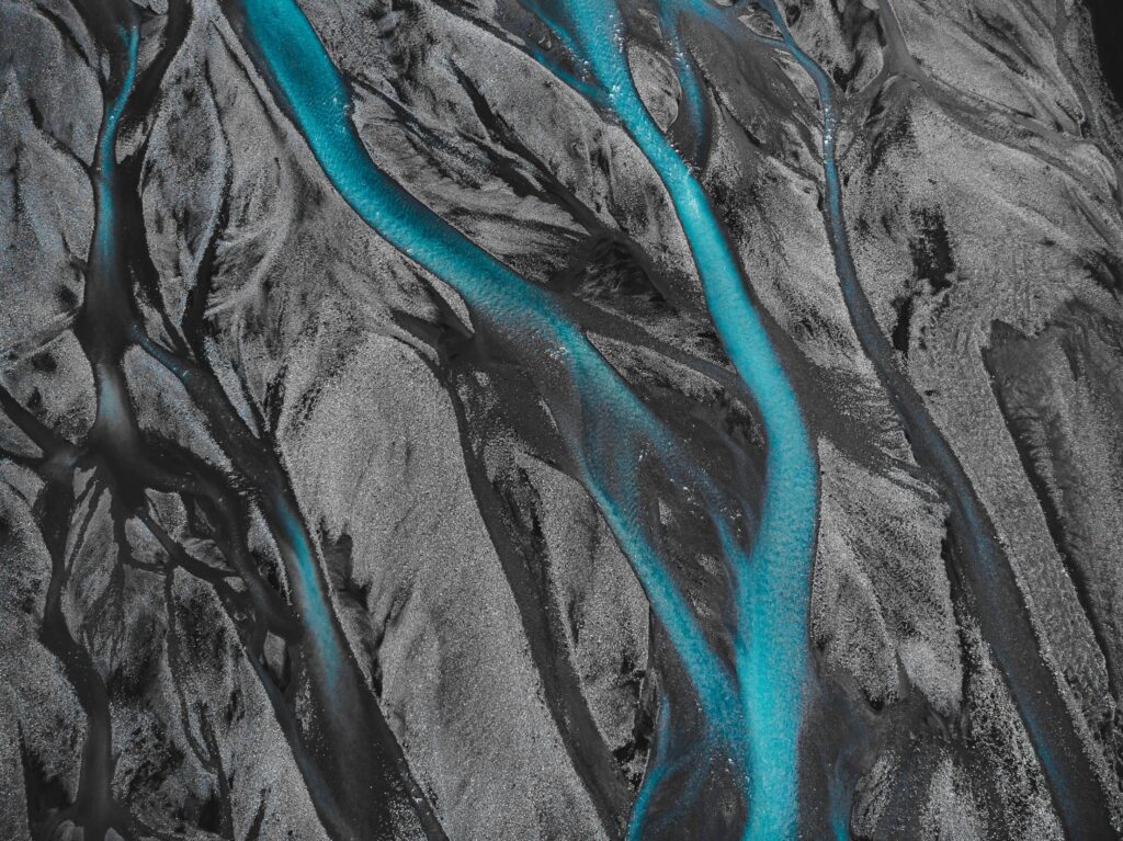 Texture of an Icelandic River in a Black Sand Free Photo