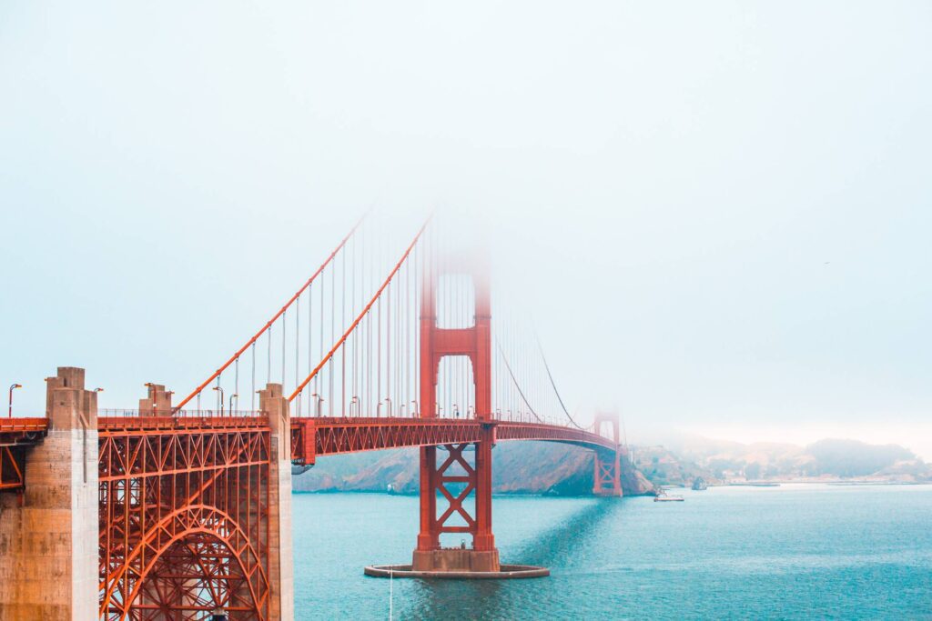 The Golden Gate Bridge Partly Covered in Fog Free Photo