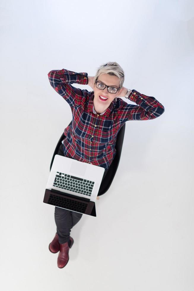 top view of young business woman working on laptop computer Stock Free