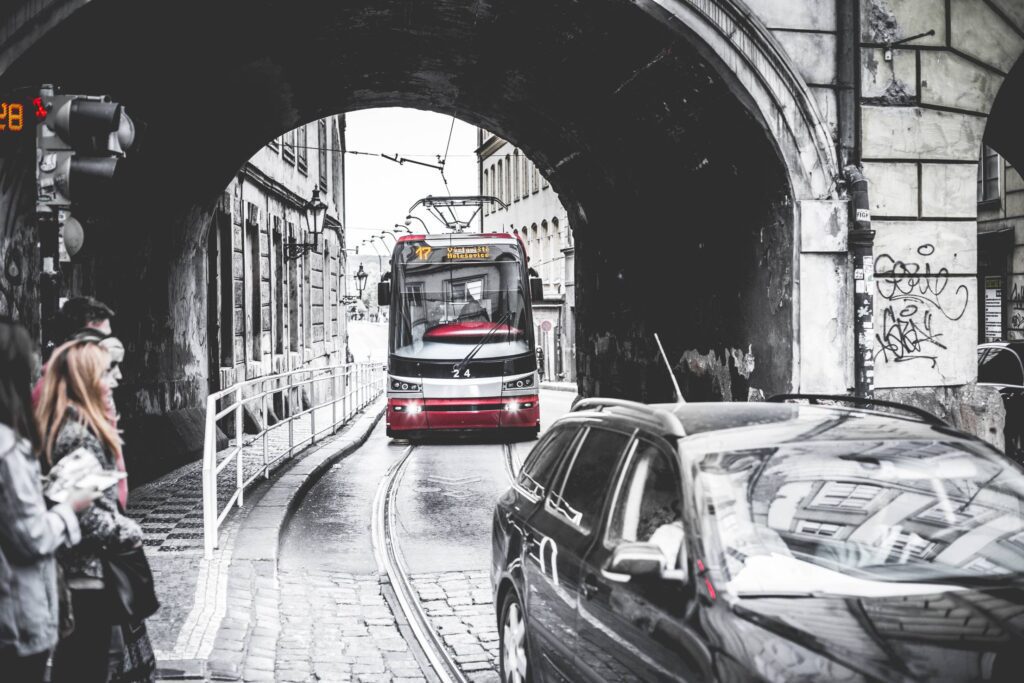 Tram Going Through The Tunnel Under The Bridge Free Photo