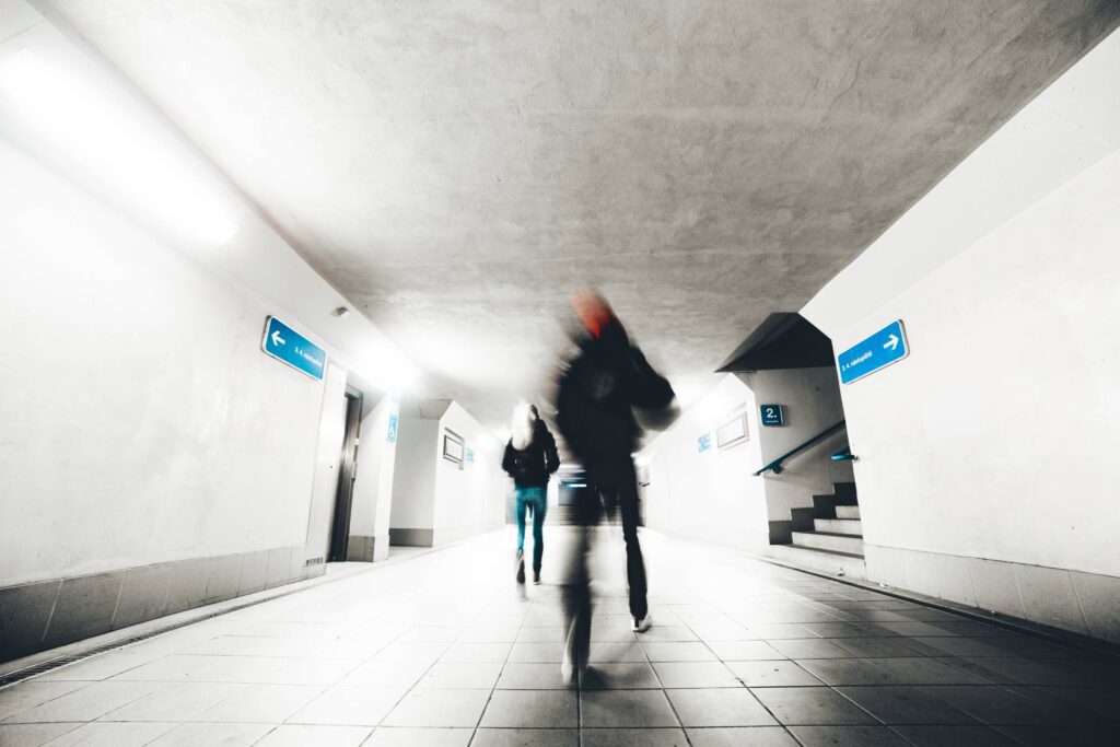 Two People Go Through The Underpass Free Photo