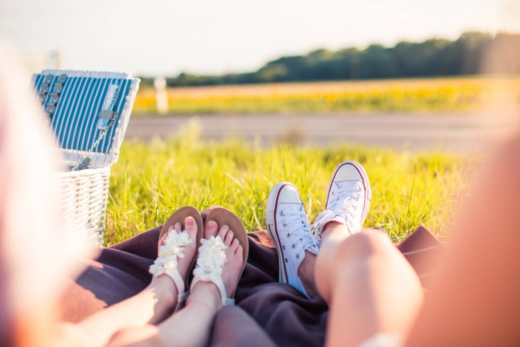 Two Young Girls Enjoying Their Roadtrip Picnic Free Photo