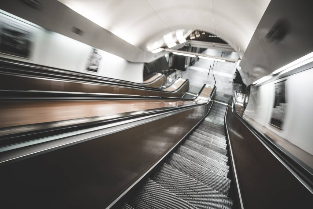 Underground Escalator in Motion Free Photo