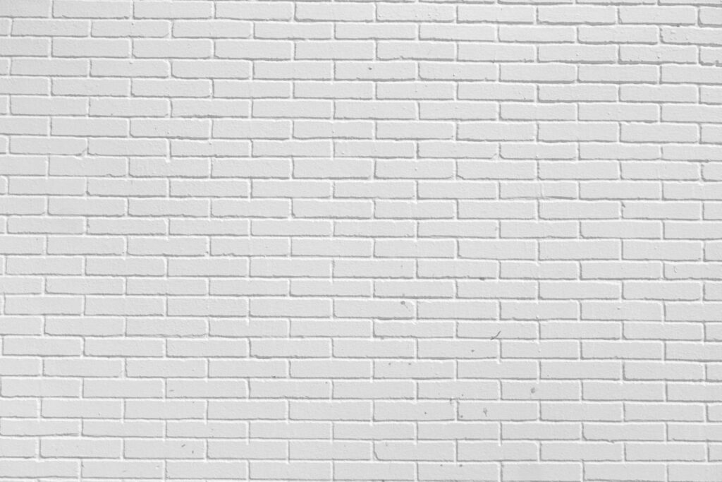 Vintage white wash brick wall texture for design. Panoramic background for your text Stock Free