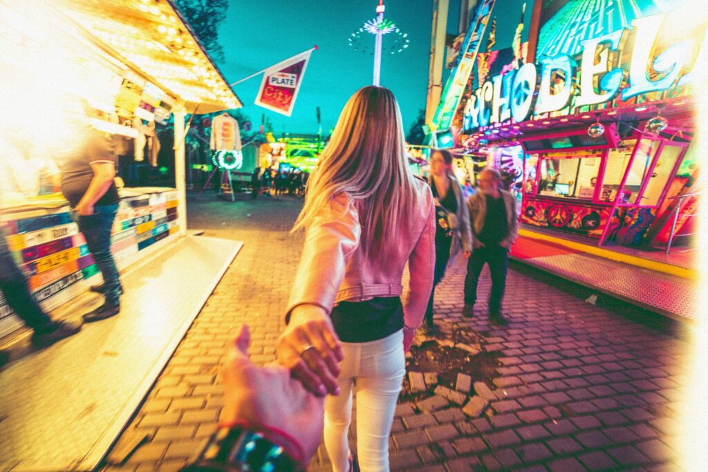 Walking Through Amusement Park with a Girl Free Photo