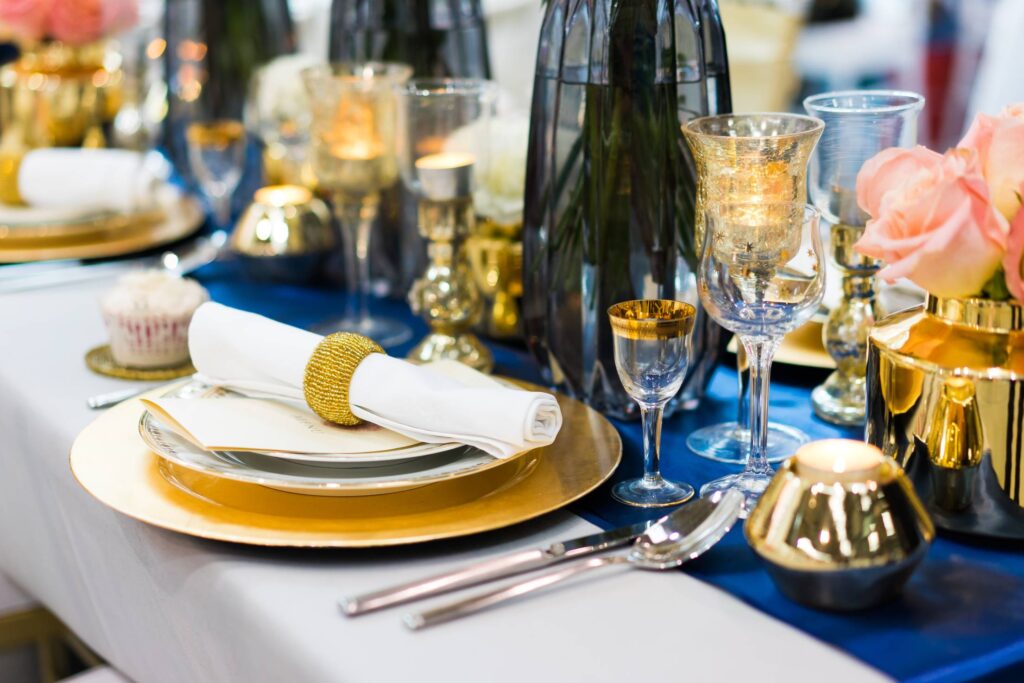 Wedding Lunch Table Setting in Blue and Gold Color Free Photo