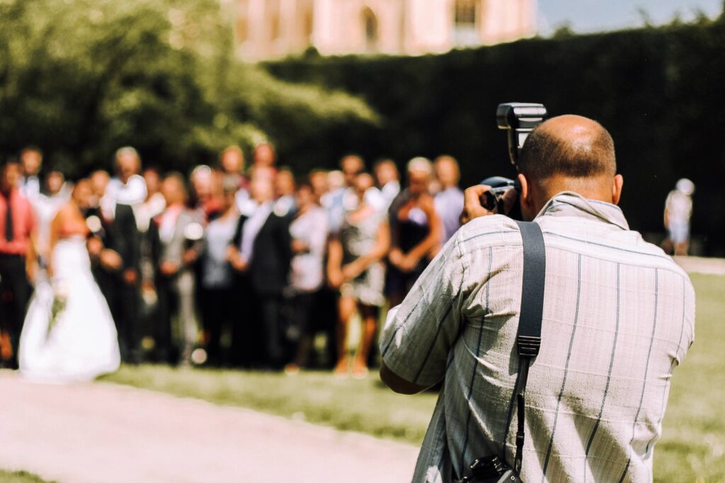 Wedding Photographer in Action Free Photo