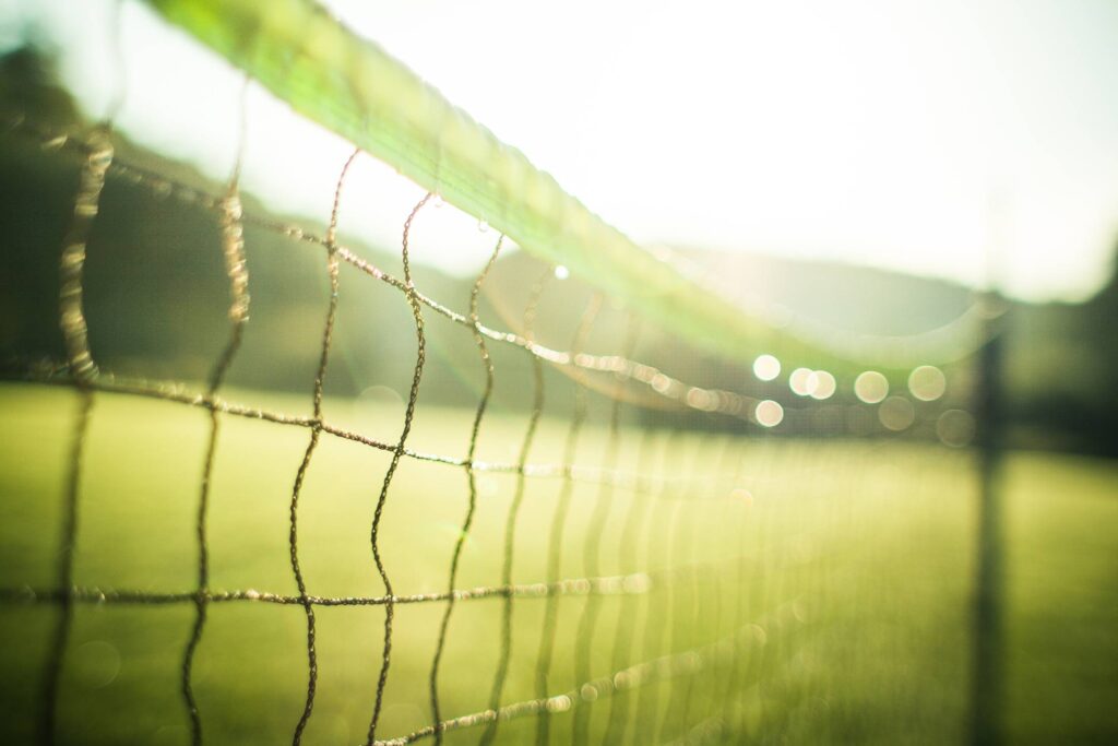 Wet Tennis Net in the Morning Free Photo