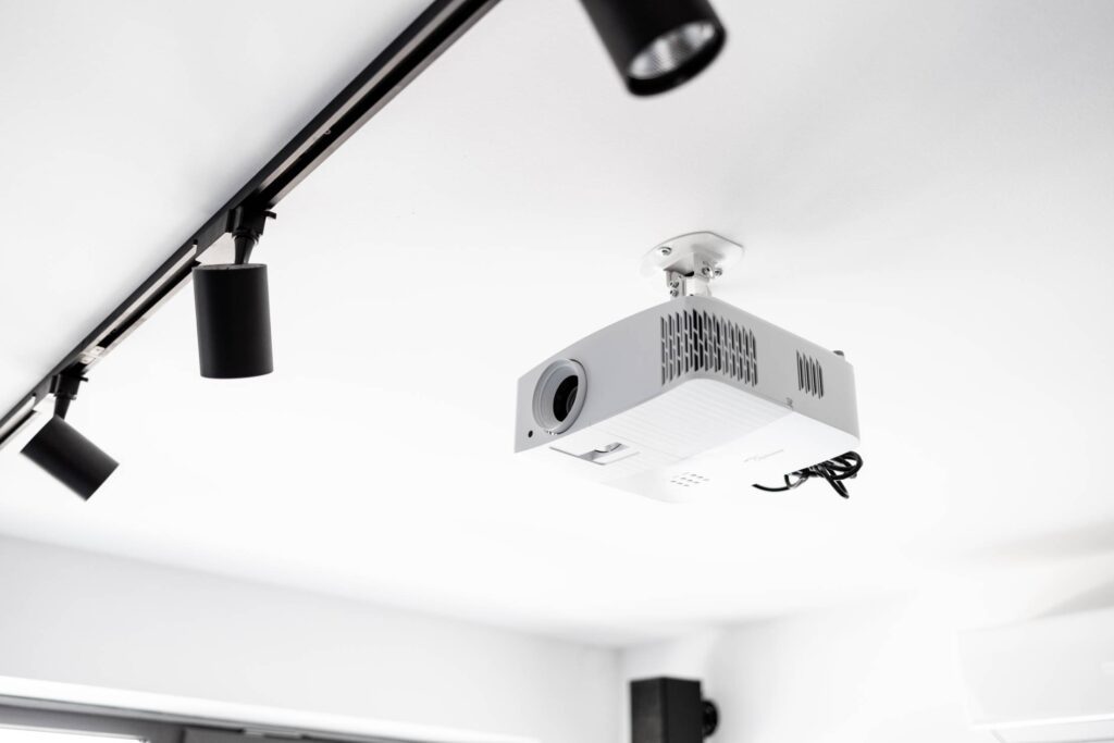 White 4K Projector Attached to Ceiling Free Photo