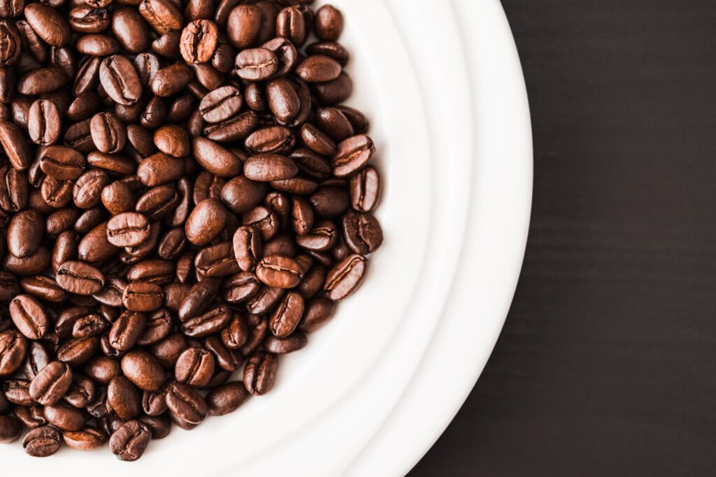 White Bowl Full of Coffee Beans Free Photo