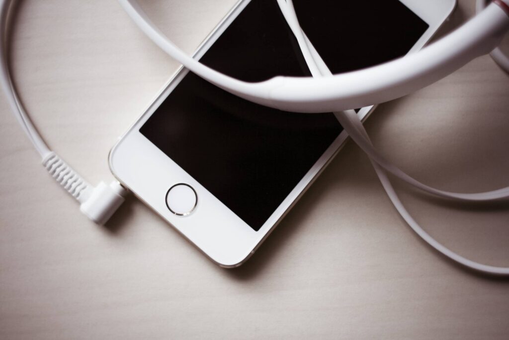 White iPhone 5S With Headphones Free Photo