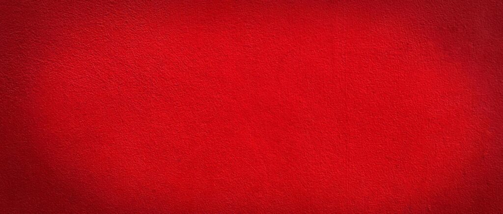 Wide panorama red wall texture for background with copy space for design Stock Free