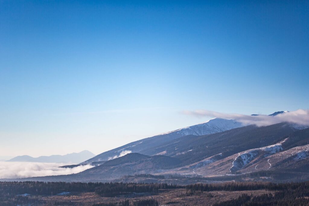 Winter Mountains and Bright Blue Sky Free Photo