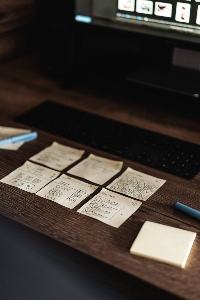 Wireframe Website Design Layout Ideas on Sticky Notes Free Photo